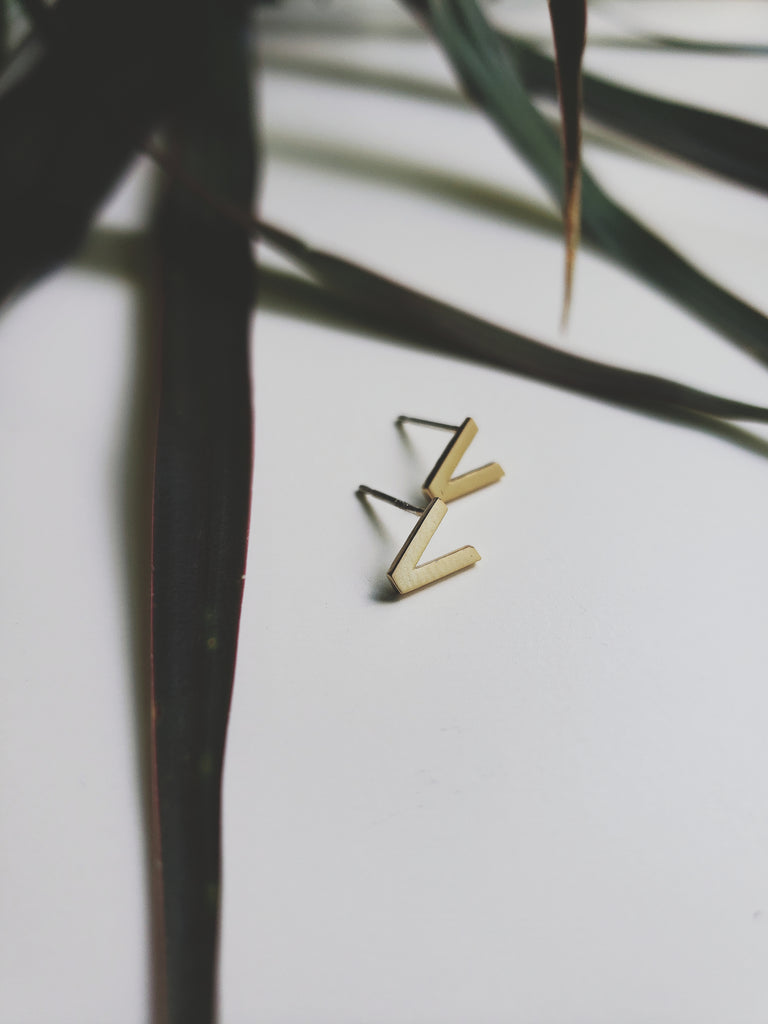 V Initial Studs