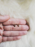 V Initial Studs