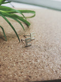 E Initial Studs